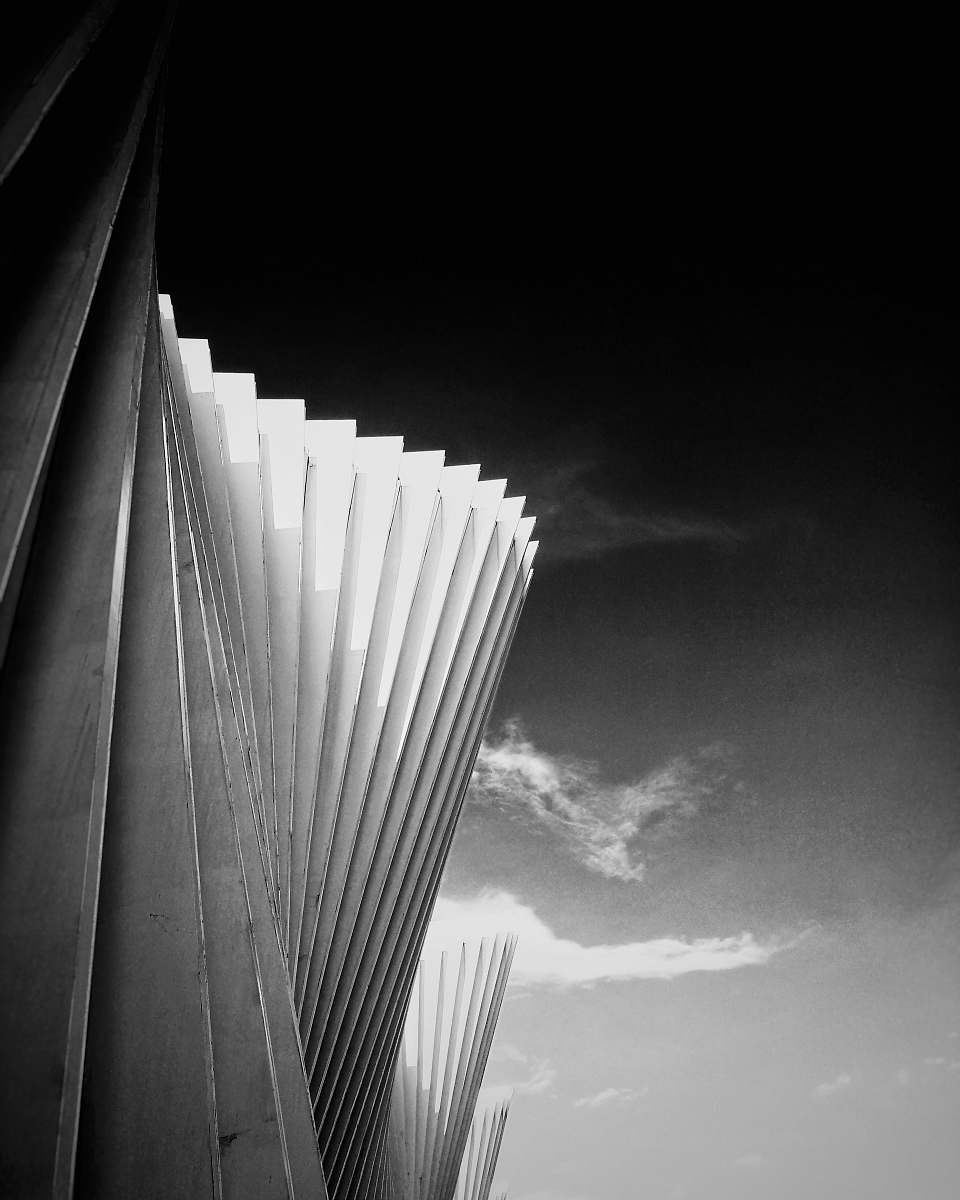 via don leuratti grayscale photography of building 2/2